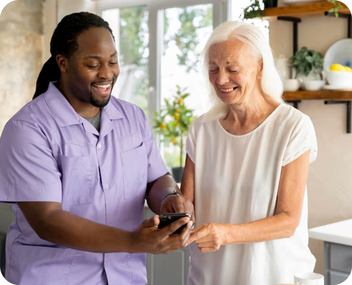 Caregiver supporting an older adult at home